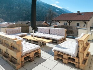 Sky, Table, Furniture, Outdoor Bench, Building, Wood, Window, Tree, Outdoor Furniture, Mountain