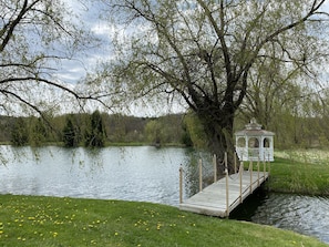 pond bridge and gazebo - bridge lit at night - spring