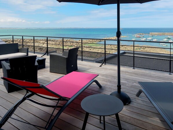 Water, Sky, Furniture, Property, Table, Shade, Chair, Cloud, Outdoor Furniture, Outdoor Table