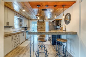 Modern Industrial Full Kitchen with concrete counter tops w/ Wolfe refrigerator