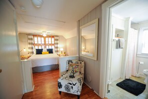 This space is now outfitted with a small desk & chair for getting ready or work.
