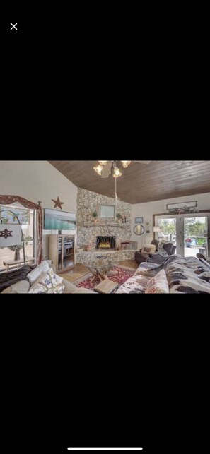 Comfy living room right off kitchen with a
Cozy fireplace!