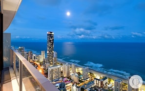 Balcony features glittering ocean and city views