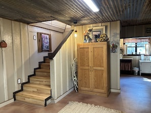 Armoire next to the stairs