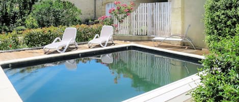 Water, Plant, Building, Swimming Pool, Sky, Chair, Body Of Water, Tree, Grass, Natural Landscape