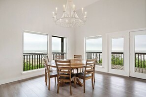 This dining area is located next to the kitchen