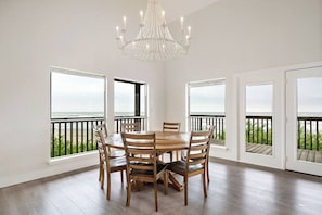 This dining area is located next to the kitchen