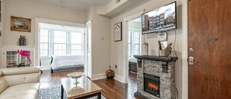 Livingroom with fireplace and smart TV