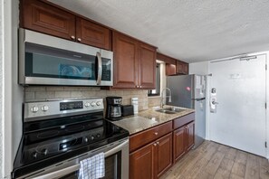 The kitchen is fully stocked to make meal prep a breeze.