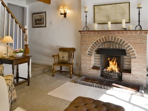 Welcoming living room with open fire | Toad Hall, Helmsley