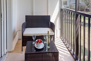 Enjoy your favorite wine and fruit on your private screened lanai.