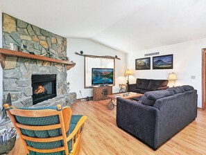Main Level Living Room with Gas Log Fireplace & Flat Srceen TV