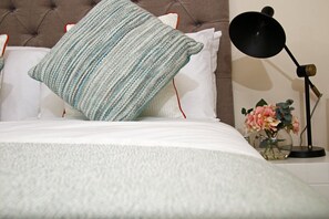 Bed with hotel quality linen