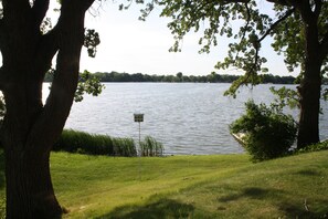 Sloping lawns with views of the lake