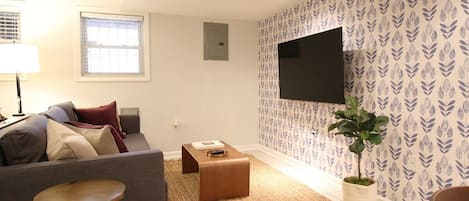 Living space includes a TV with smart streaming and broadcast channels