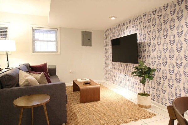Living space includes a TV with smart streaming and broadcast channels