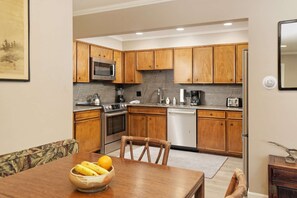 The dining table comfortably accommodates up to 8 people.  You will enjoy wonderful dinners with your friends or family.
