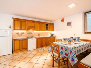 Cabinetry, Furniture, Countertop, Table, Window, Interior Design, Kitchen, Floor, Flooring, Wood
