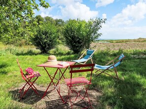 Plant, Sky, Cloud, Furniture, Plant Community, Table, Chair, Natural Landscape, Outdoor Furniture, Shade