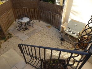 Bottom Terrace with table,chair and gas bbq