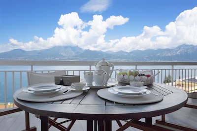 Holiday Apartment “Romantic Big Terrace” next to Lake Garda with Lake View, Mountain View, Wi-Fi & Terrace; Parking Available