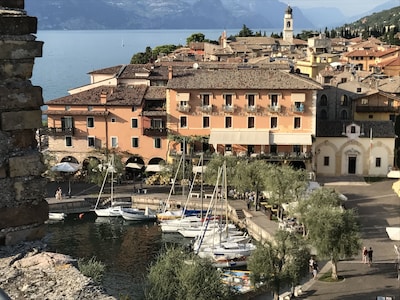 Holiday Apartment “Romantic Big Terrace” next to Lake Garda with Lake View, Mountain View, Wi-Fi & Terrace; Parking Available