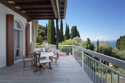 Holiday Apartment “Romantic Big Terrace” next to Lake Garda with Lake View, Mountain View, Wi-Fi & Terrace; Parking Available