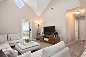 Living Rooms With Ocean Views In The Distance