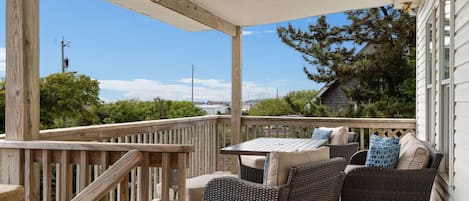Outdoor Seating With Ocean Views To Enjoy Your Morning Coffee!