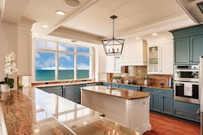 This luxurious kitchen is an elegant addition to this stunning vacation home