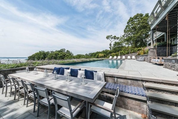 Dine al fresco while watching the boats and sea planes 