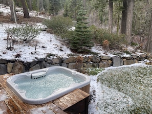 We have a hot tub on the back deck overlooking the mountains and creek.