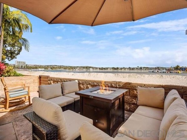 private patio with private firepit and BBQ