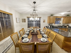 Lots of comfy seating in the vibrant dining room, and a fully stocked kitchen