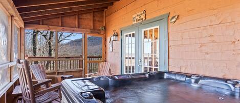 Total Relaxation - What could be better than a dip in the hot tub in your mountain cabin screened porch every evening?