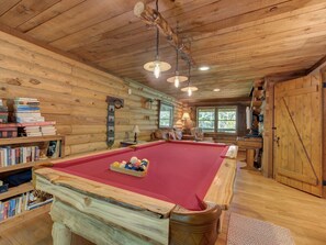 Game Room that doubles as a family room, complete with an additional seating area.
