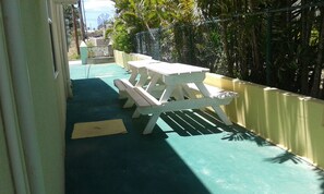 Place to sun or in the cool of the day to relax or eat outside.