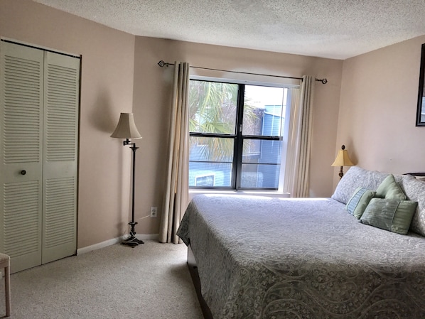 Master bedroom with king bed,walk in closet, private bathroom