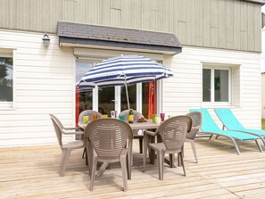 Furniture, Table, Window, Chair, Building, Outdoor Table, Wood, Shade, Outdoor Furniture, Umbrella