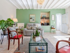 Furniture, Couch, Property, Table, Green, Picture Frame, Plant, Shelf, Azure, Living Room