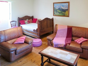 Couch, Furniture, Property, Table, Building, Comfort, Wood, Purple, Interior Design, Living Room