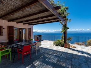 Plant, Water, Sky, Furniture, Property, Building, Table, Azure, Flowerpot, Shade