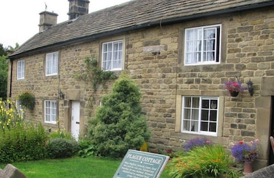 Memorial Cottage is a Grade II listed, period stone, terraced holiday cottage