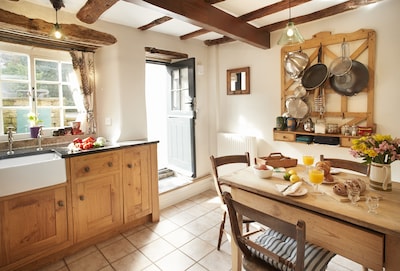 Memorial Cottage is a Grade II listed, period stone, terraced holiday cottage