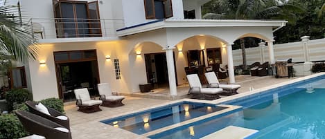 Expansive patio facing the sea.
