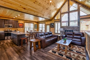 View from the entrance of the cabin. Plenty of light and modern furniture