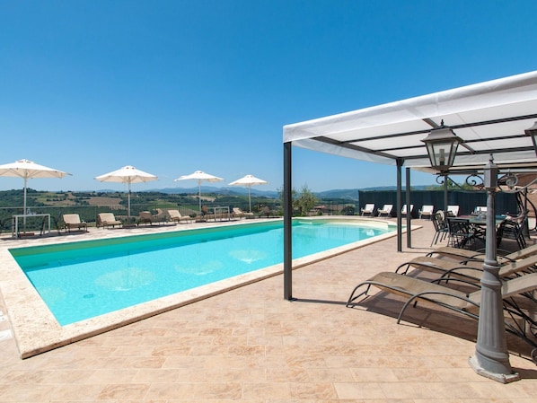 Water, Building, Sky, Swimming Pool, Plant, Shade, House, Rectangle, Outdoor Furniture, Sunlounger