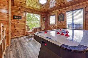 Game room features exciting table games, including hockey, and an arcade area.