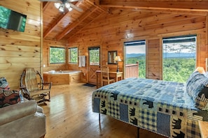 This photo offers a full view of the spacious bedroom.