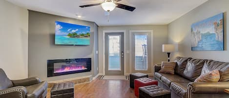 Large Roku TV and fireplace in family room